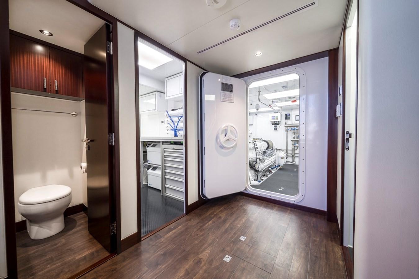 a bathroom with a large mirror aboard LION'S DEN Yacht for Sale