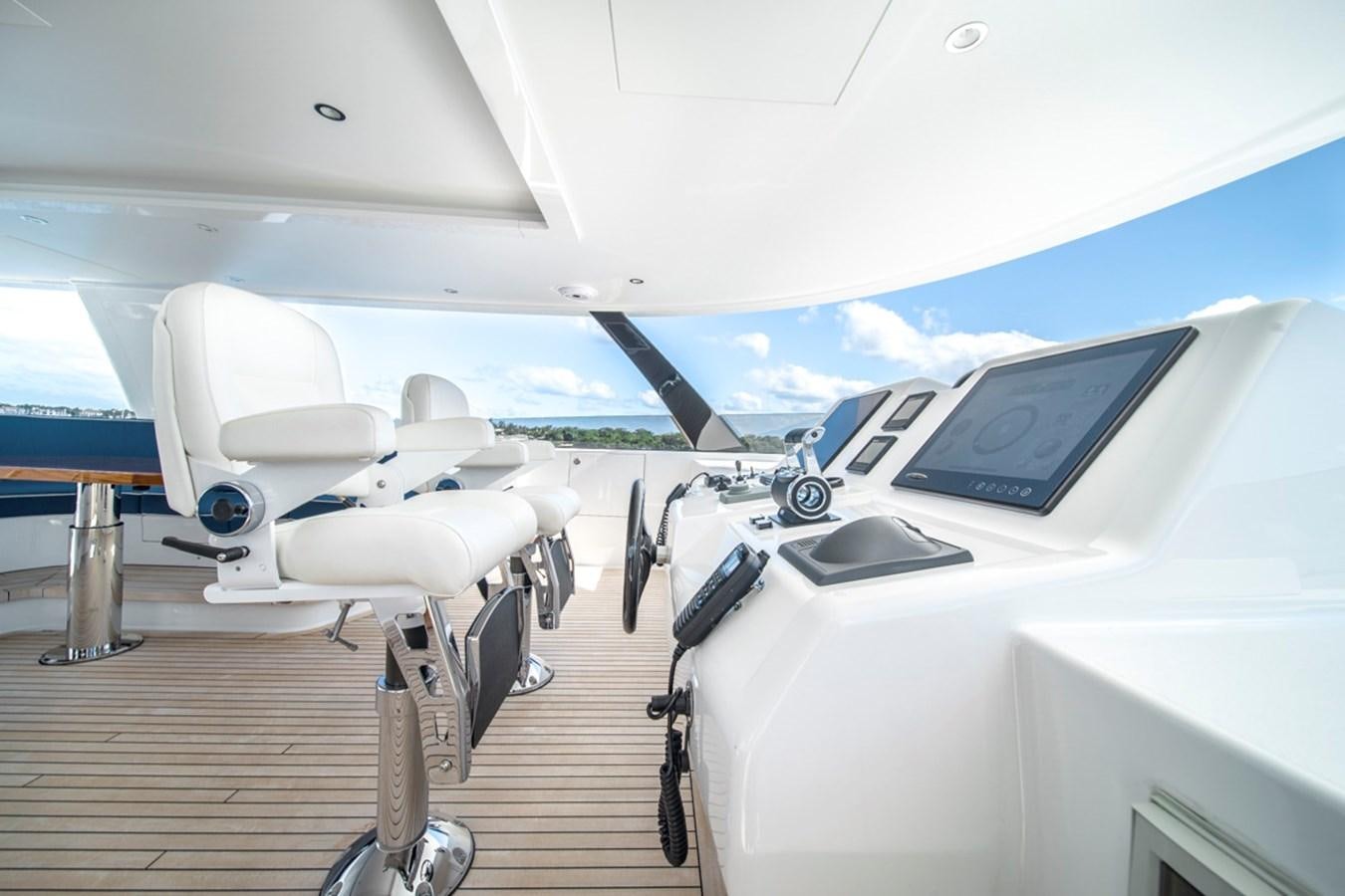a plane with a laptop on the front aboard LION'S DEN Yacht for Sale