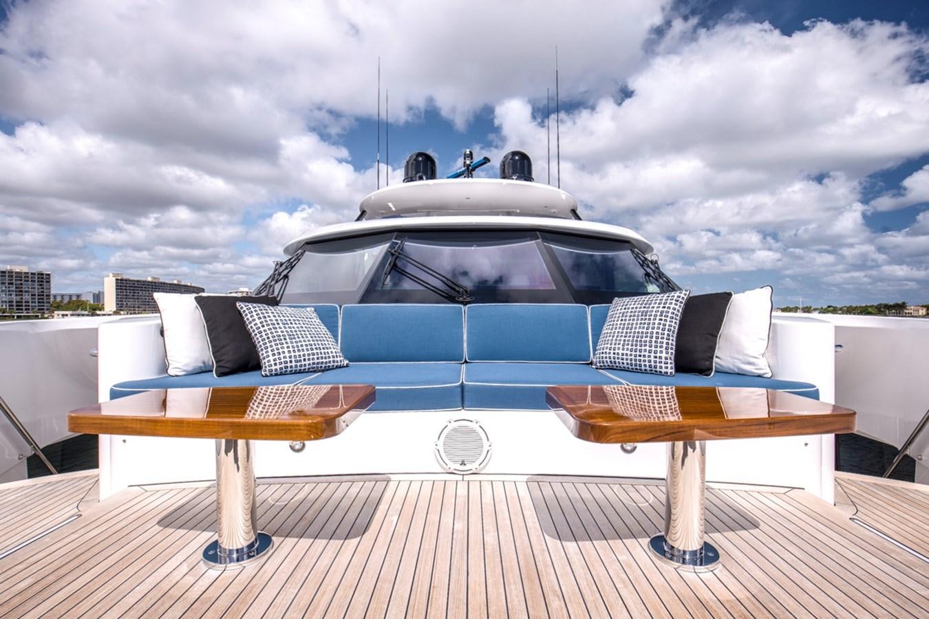 a white car on a rooftop aboard LION'S DEN Yacht for Sale