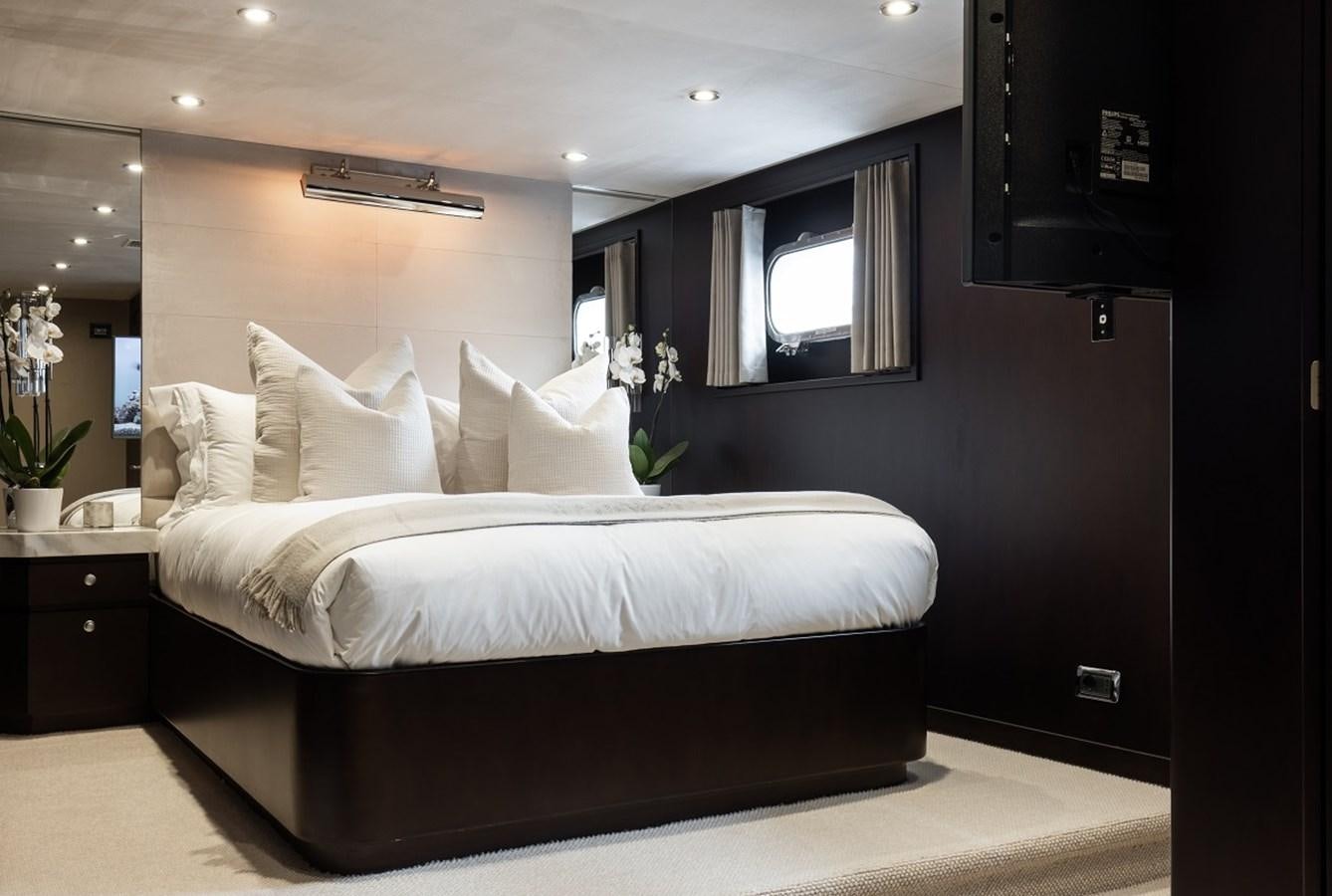 a bedroom with a large bed aboard CALLISTA Yacht for Sale