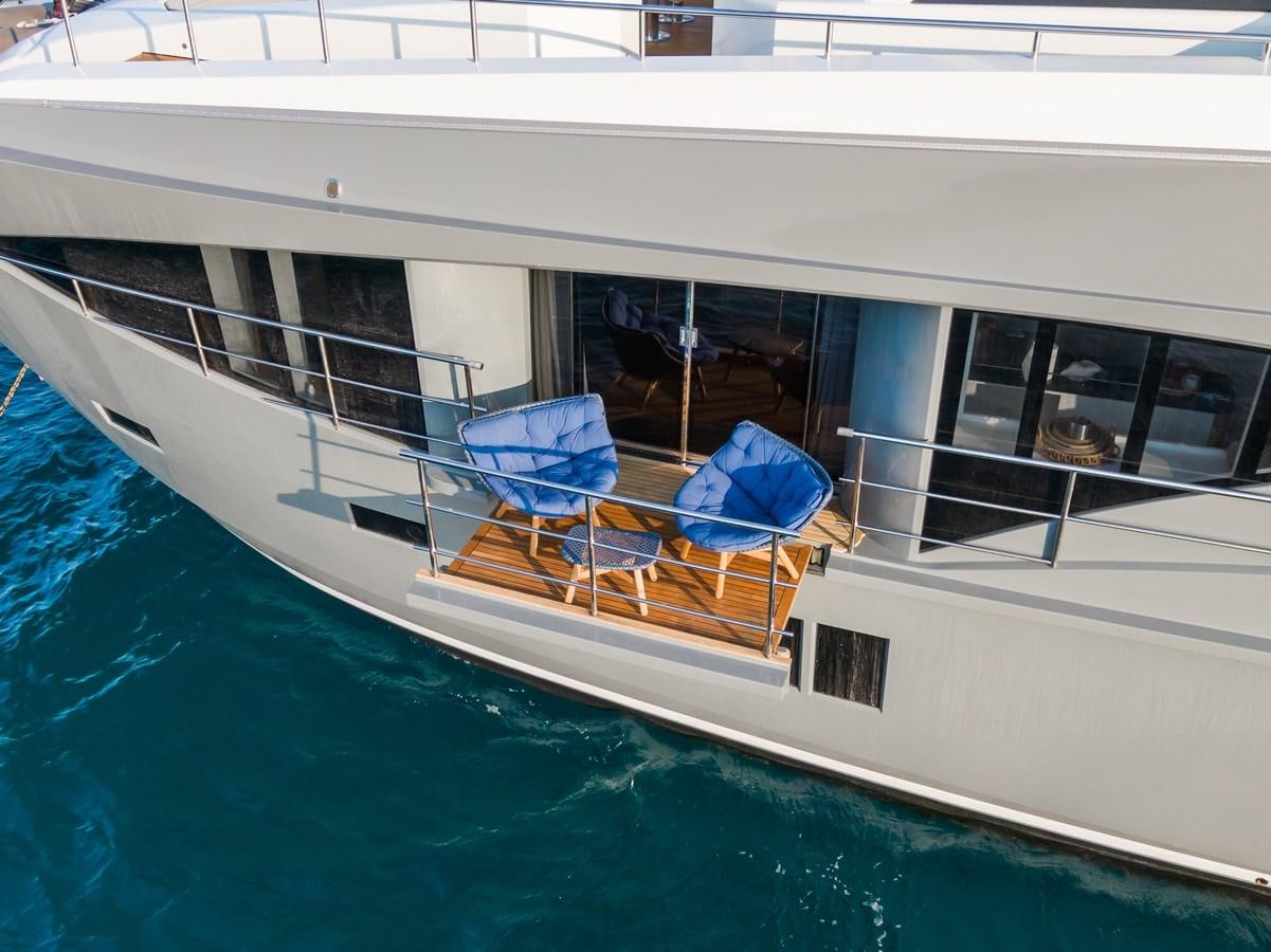 a boat with chairs on the deck aboard LEONIDAS Yacht for Sale