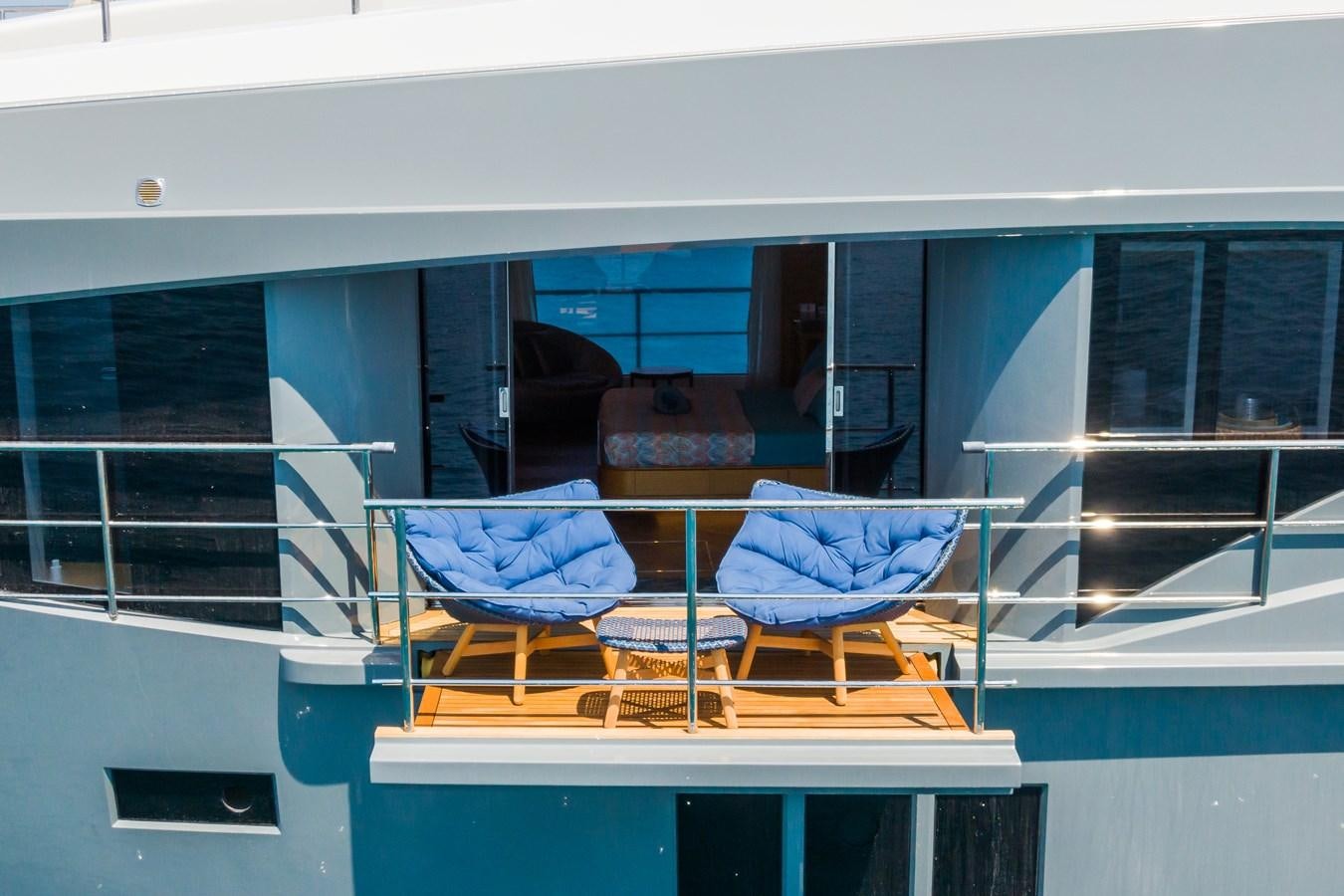 a group of chairs in a room aboard LEONIDAS Yacht for Sale