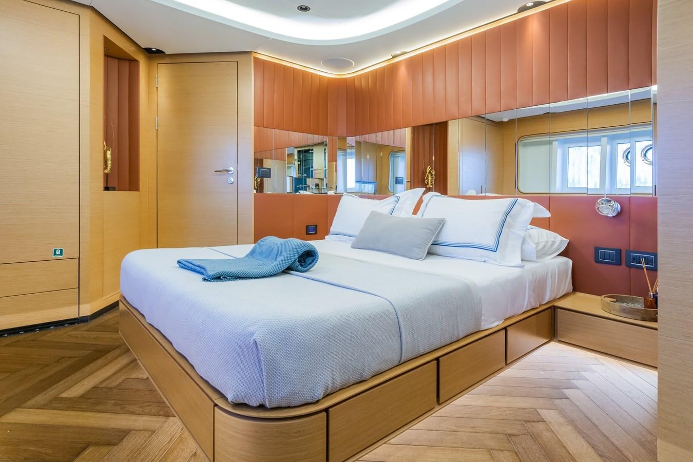 a bed in a room aboard LEONIDAS Yacht for Sale