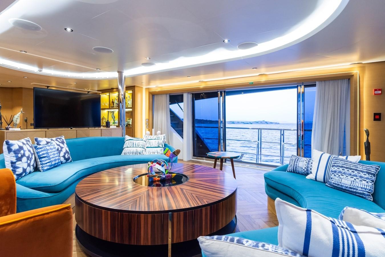 a living room with a large balcony aboard LEONIDAS Yacht for Sale