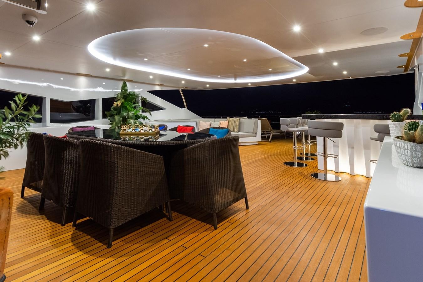 a large room with a table and chairs and a large white ceiling aboard LEONIDAS Yacht for Sale