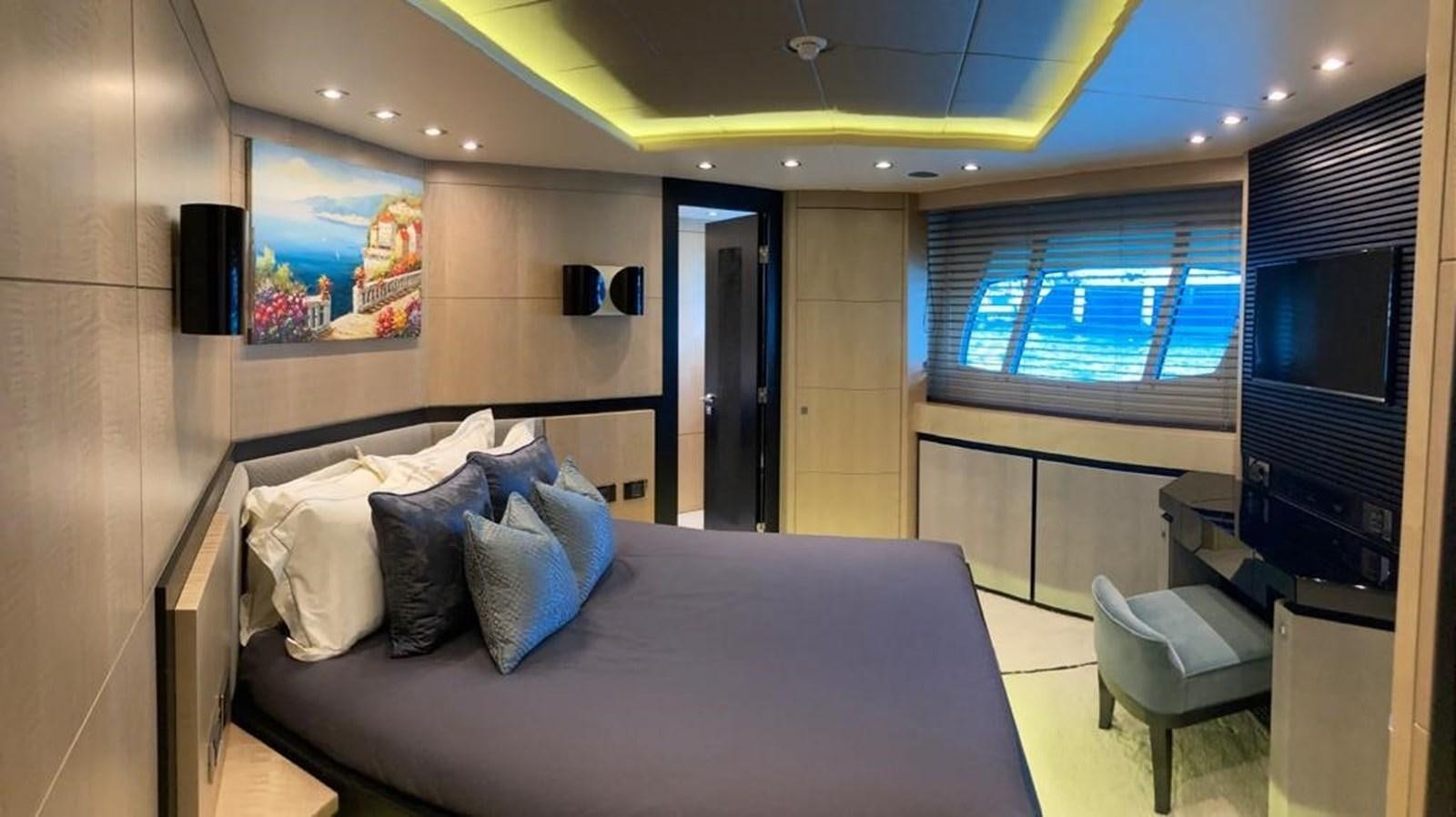 a bed in a room aboard R2 Yacht for Sale