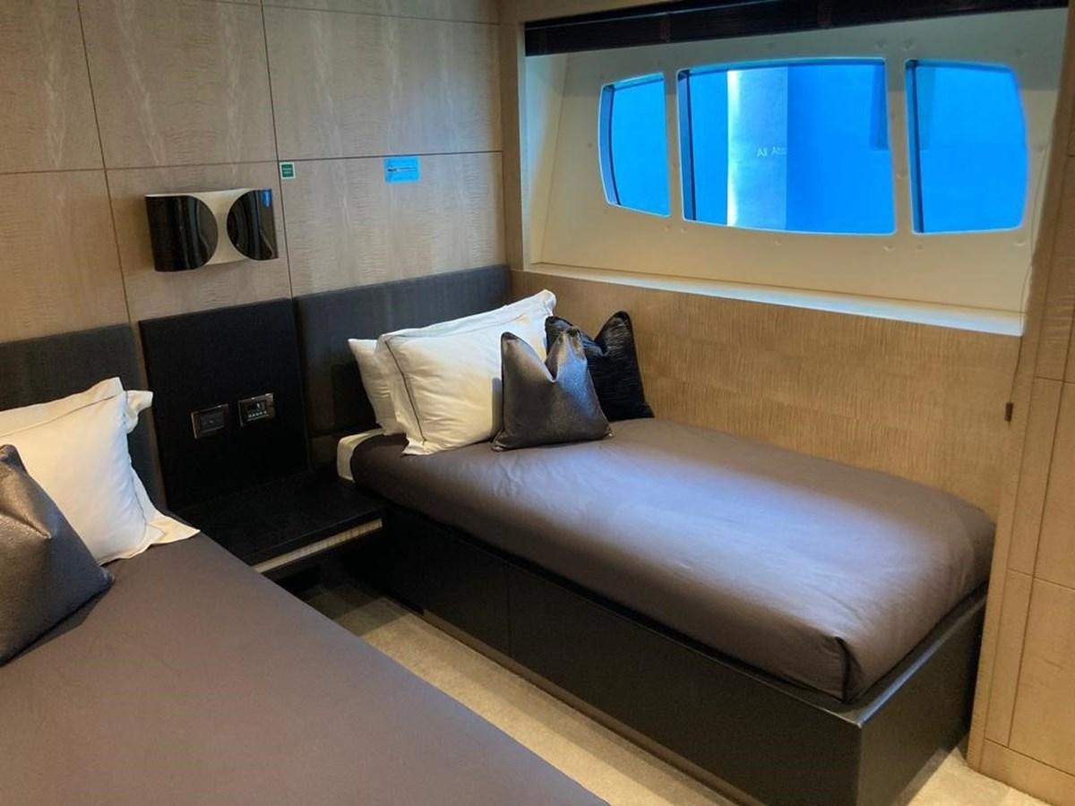 a bed in a room aboard R2 Yacht for Sale