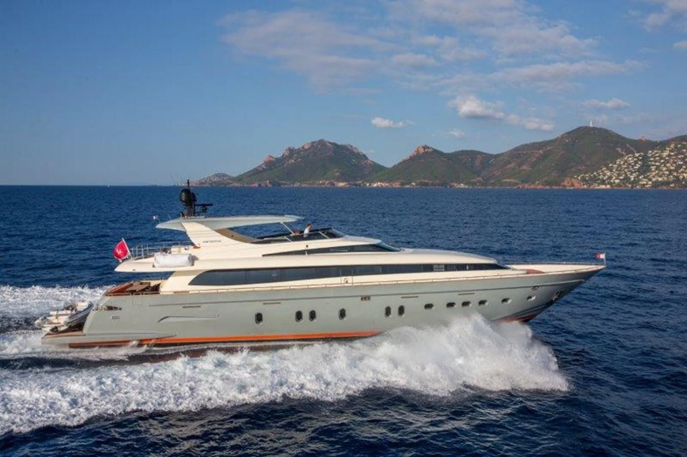 a white boat on the water aboard Y42 Yacht for Sale
