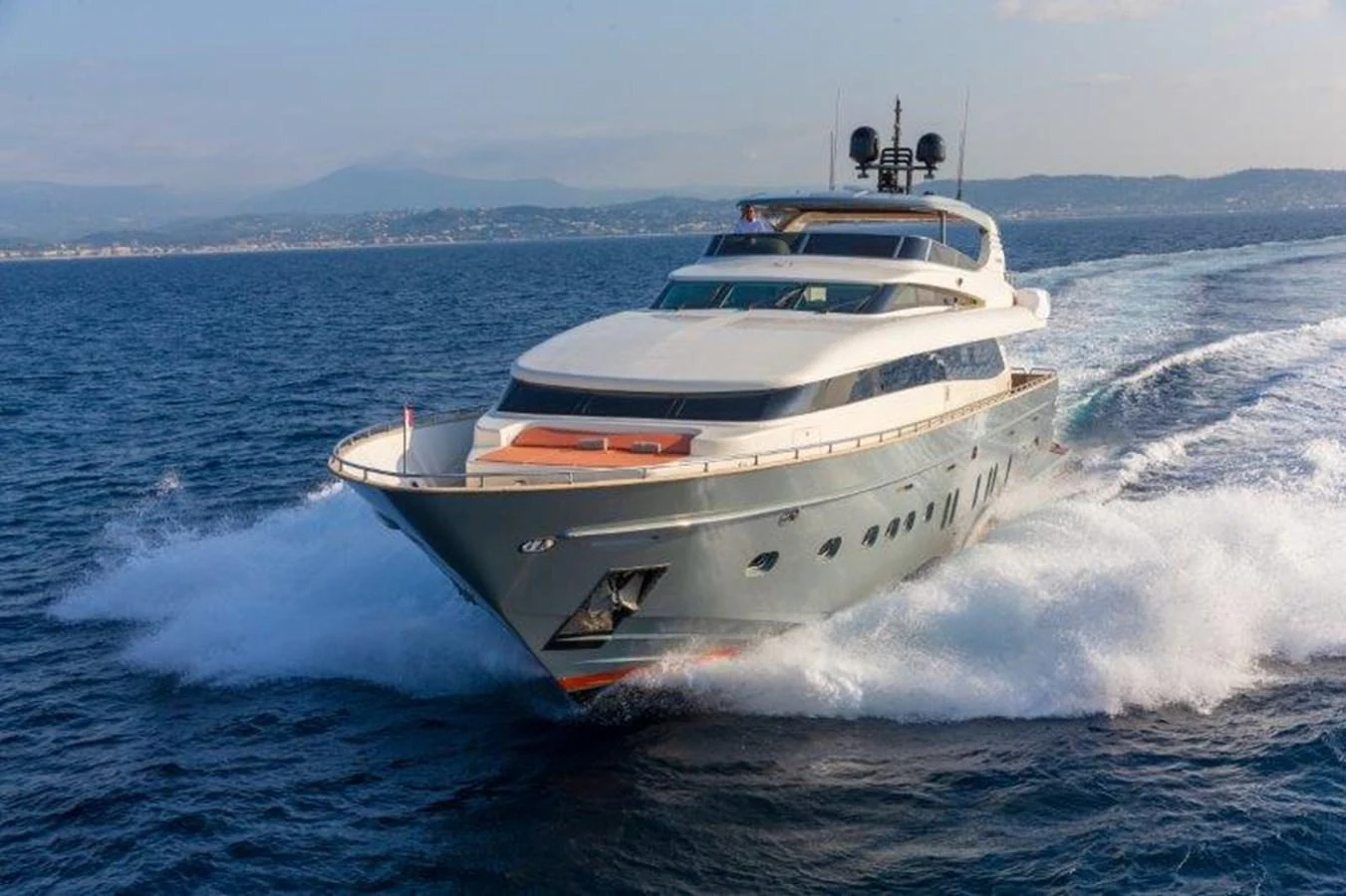 a white yacht on the water aboard Y42 Yacht for Sale