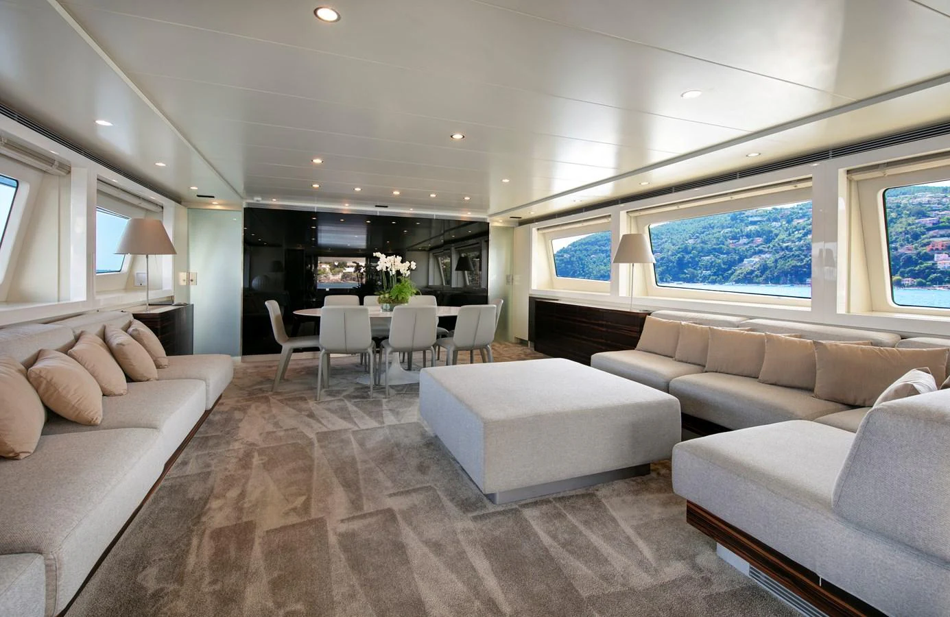 a living room with a couch and a table aboard Y42 Yacht for Sale