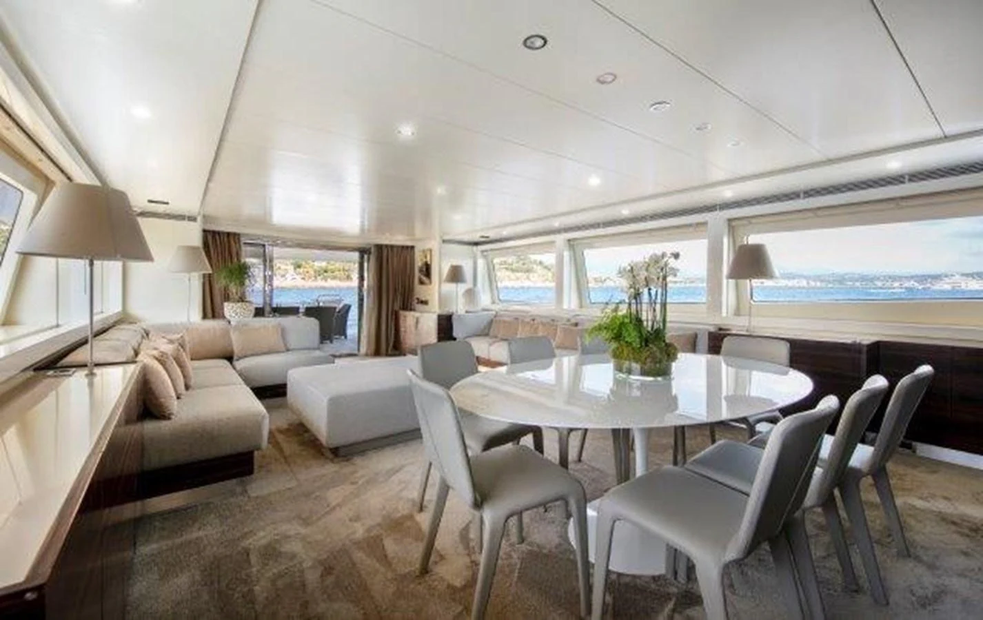 a large living room with a table and chairs aboard Y42 Yacht for Sale