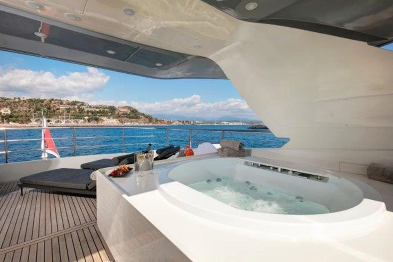 a large white tent with a pool and a view of the water aboard Y42 Yacht for Sale