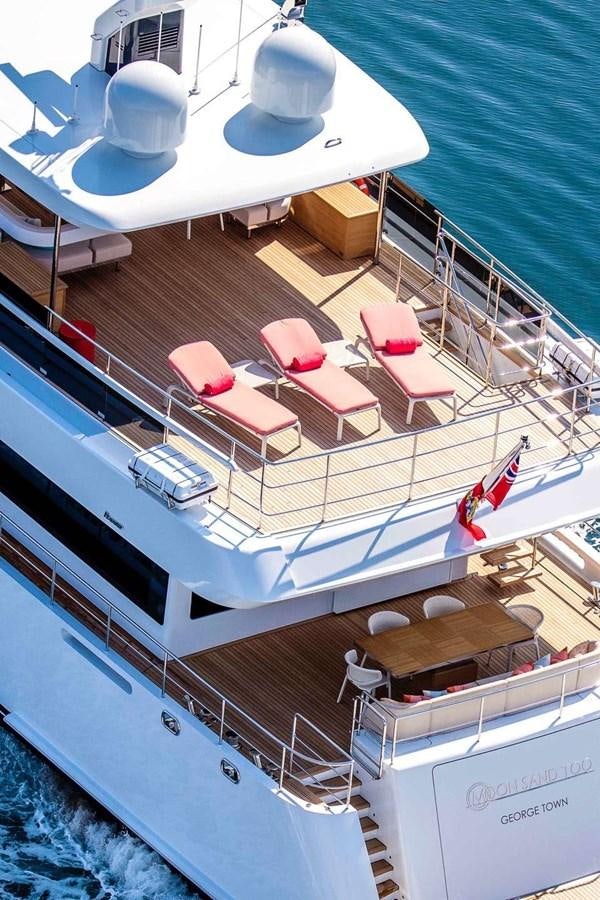 a boat with a deck and chairs on it aboard GRAY CLIFFS Yacht for Sale