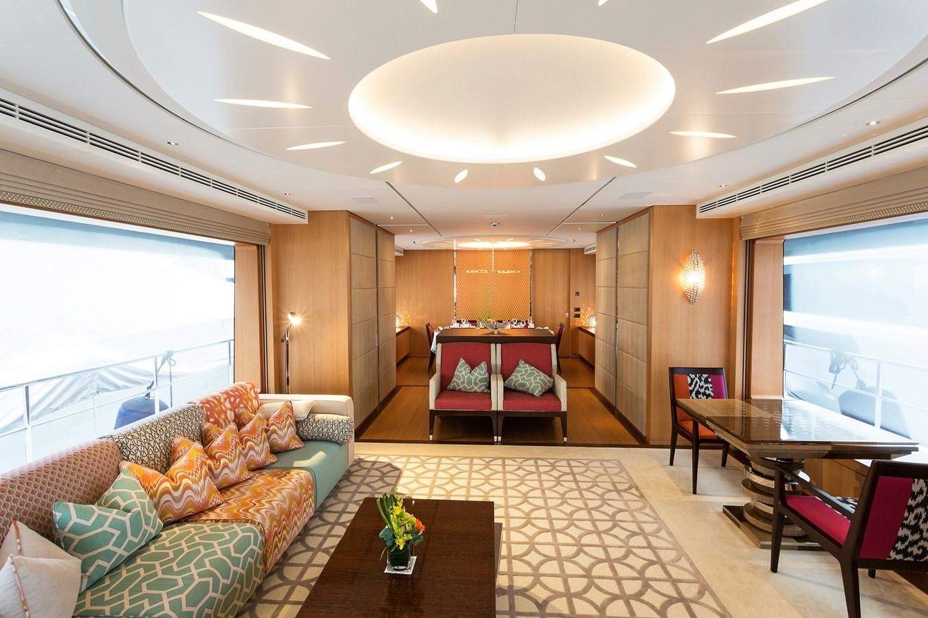 a living room with a large window aboard GRAY CLIFFS Yacht for Sale