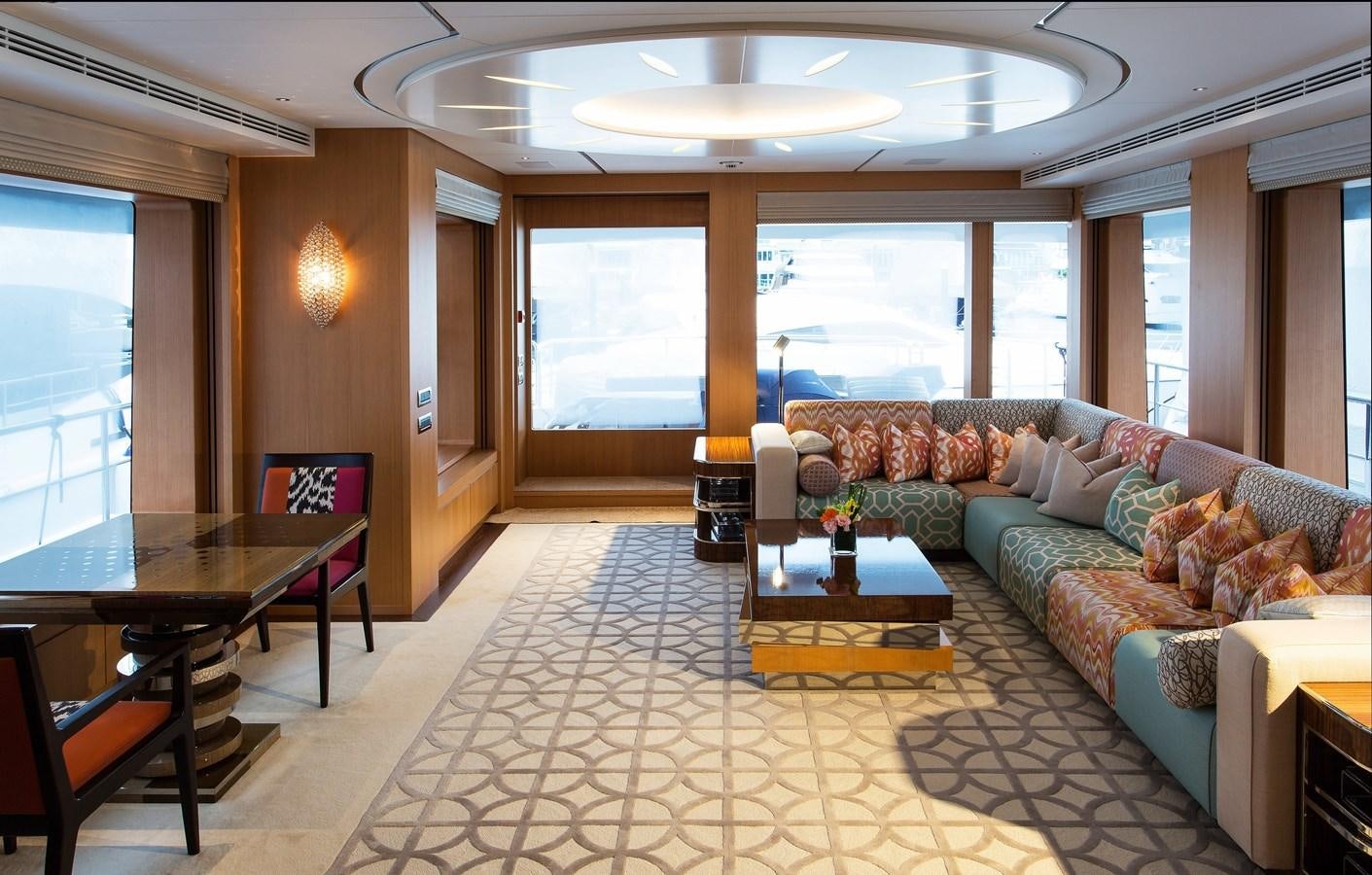 a living room with a couch and a table aboard GRAY CLIFFS Yacht for Sale