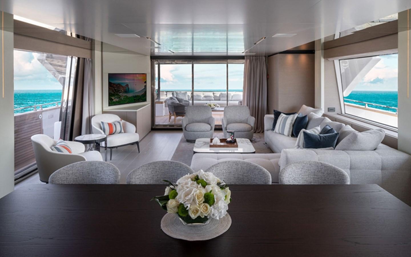 a living room with a large window aboard ADELIA Yacht for Sale