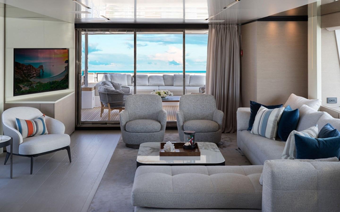 a living room with a large window aboard ADELIA Yacht for Sale