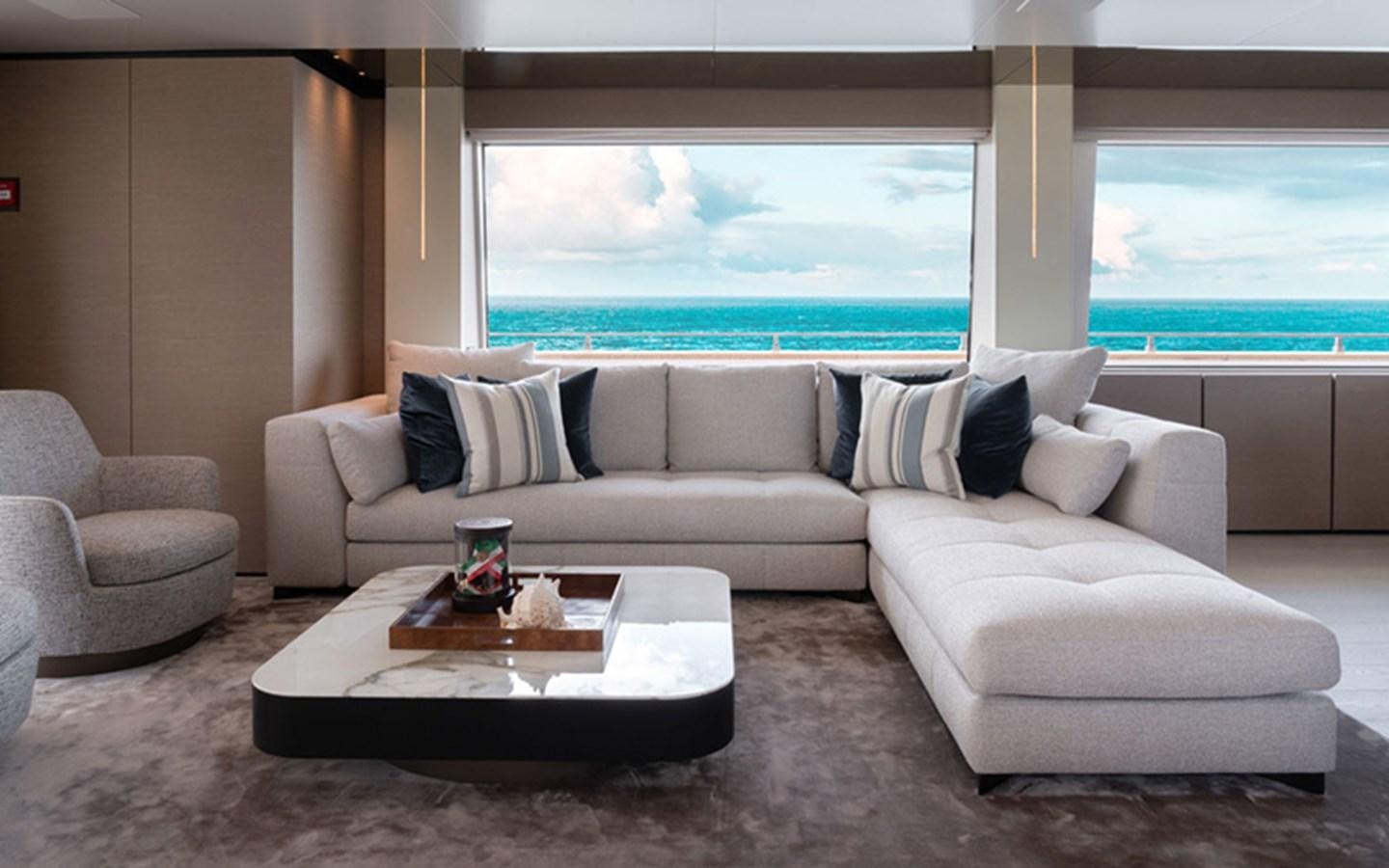 a living room with a large window aboard ADELIA Yacht for Sale