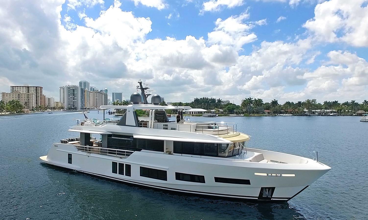 a white boat in the water aboard CYRA Yacht for Sale