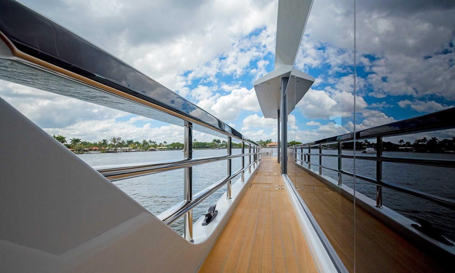 a large white boat on a body of water aboard CYRA Yacht for Sale