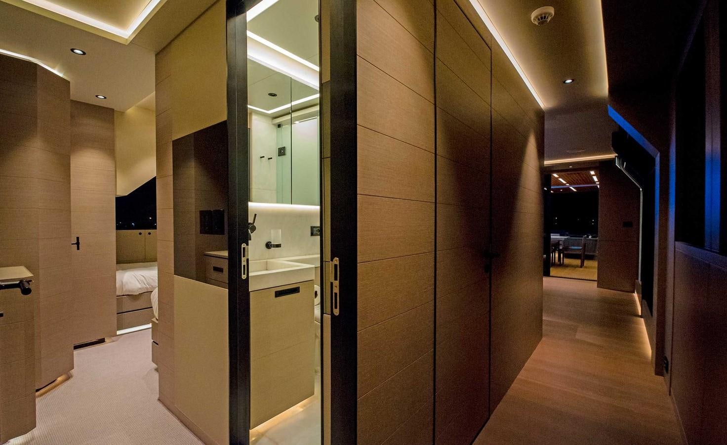a bathroom with a large mirror aboard CYRA Yacht for Sale