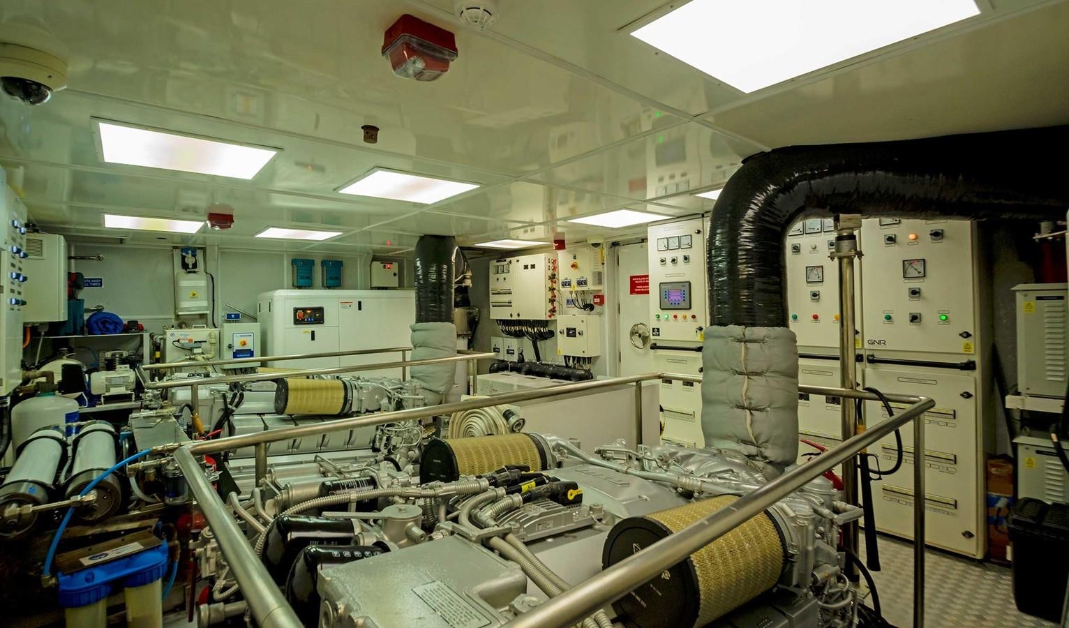 a room with machines and equipment aboard CYRA Yacht for Sale