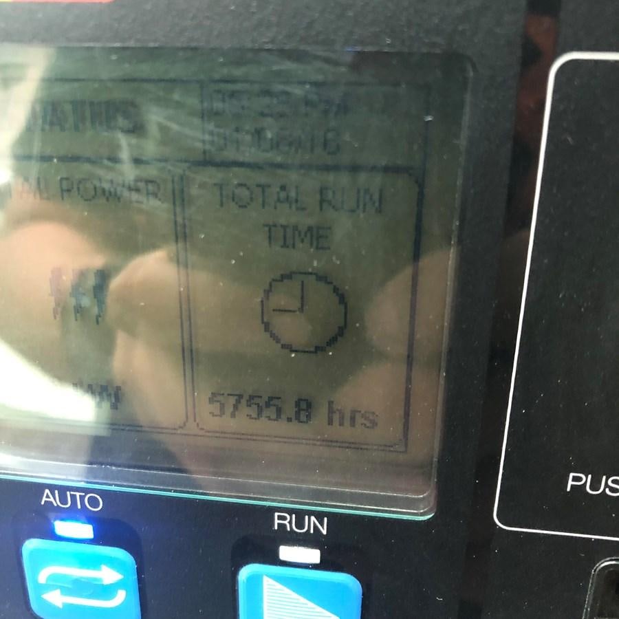 a close up of a cell phone aboard CYRA Yacht for Sale