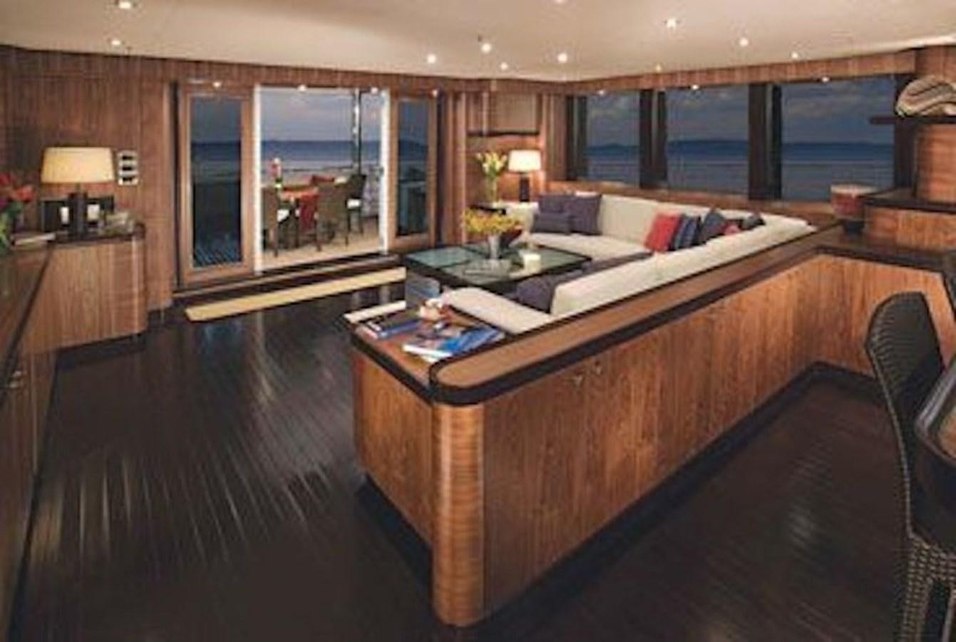 a living room with a large bed aboard NAZAR Yacht for Sale