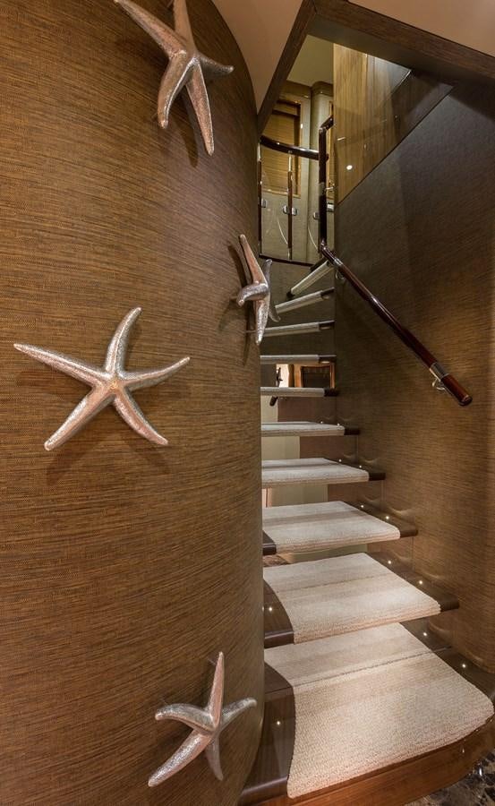 a wooden board with a few white objects on it aboard OUR TRADE Yacht for Sale