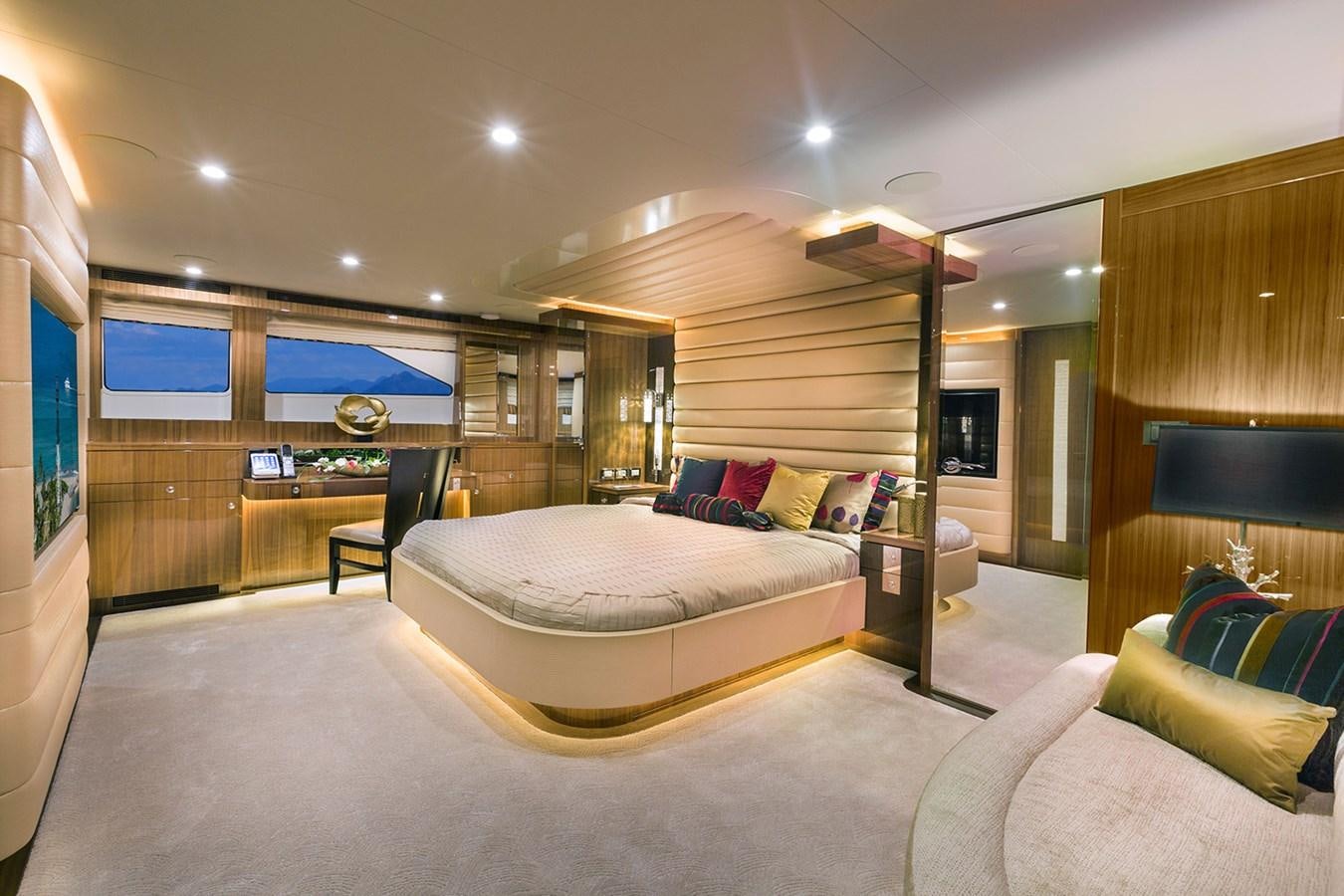 a large bedroom with a large bed aboard OUR TRADE Yacht for Sale