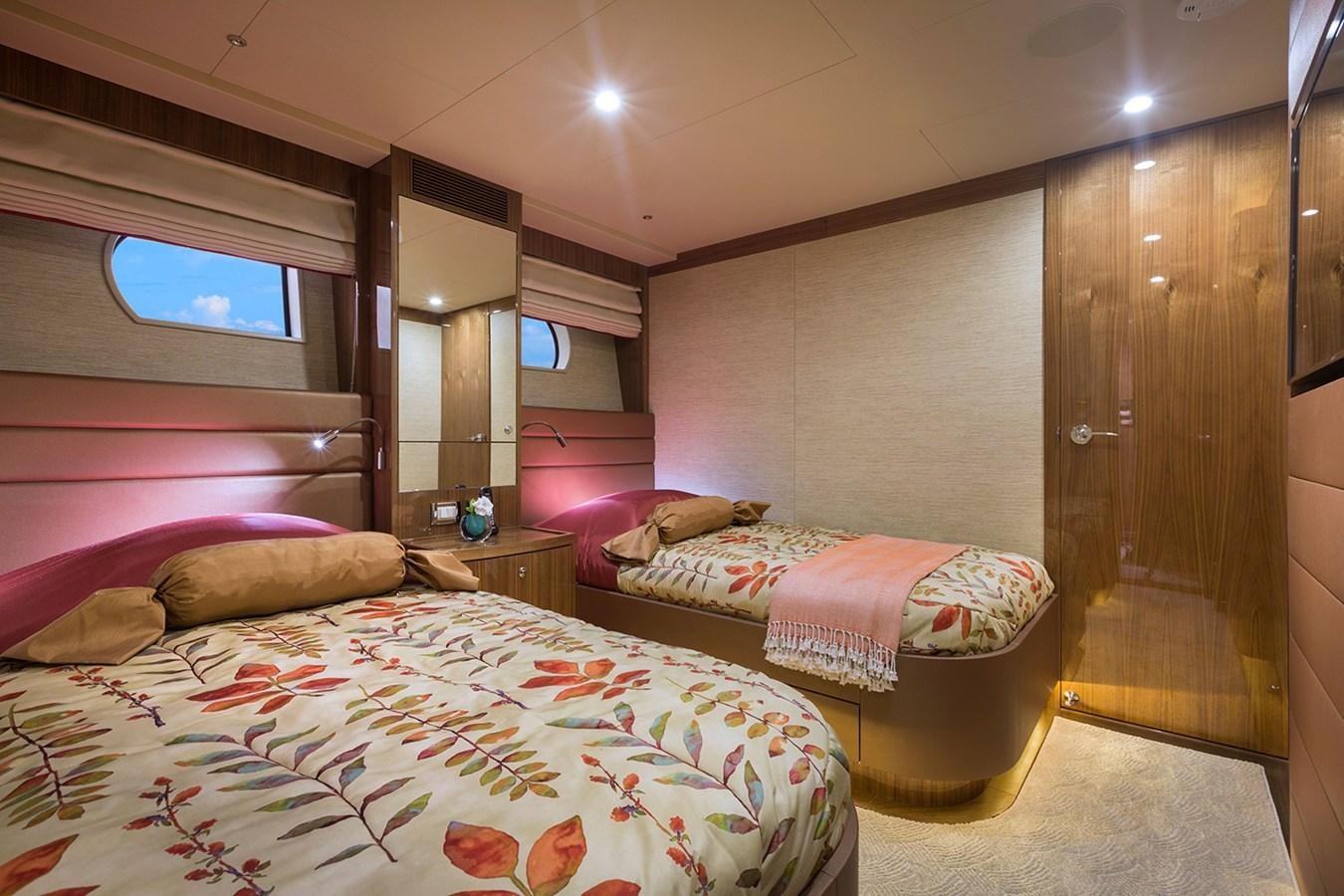 a room with two beds aboard OUR TRADE Yacht for Sale