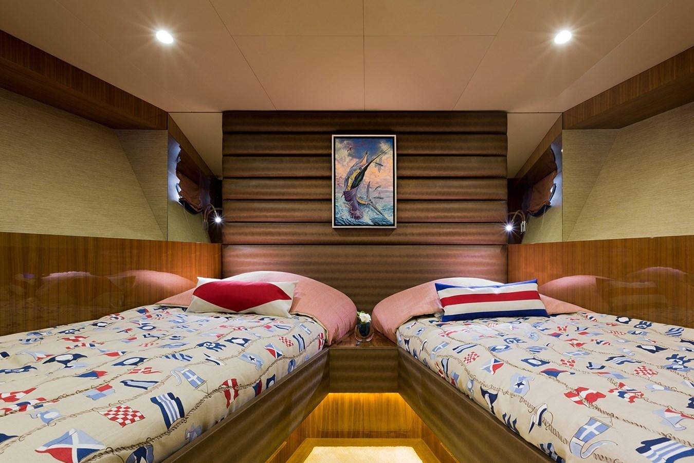 a couple of beds in a room aboard OUR TRADE Yacht for Sale