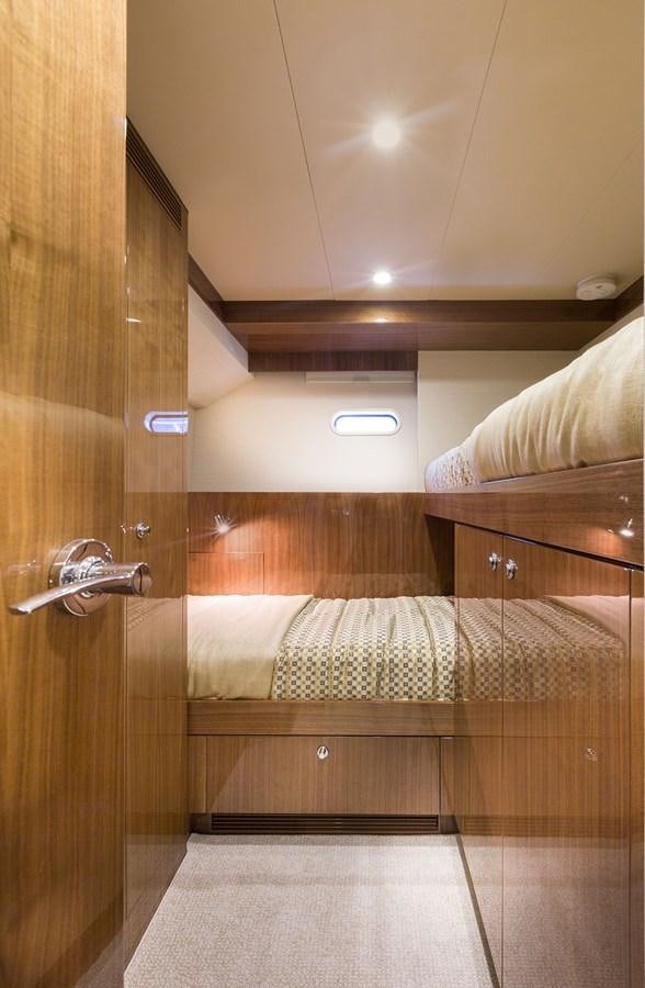 a bed in a room aboard OUR TRADE Yacht for Sale