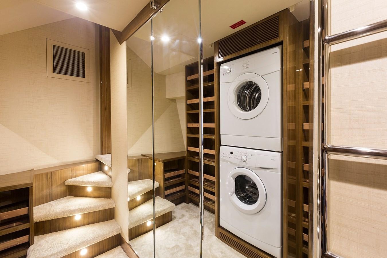 a laundry room with a washing machine aboard OUR TRADE Yacht for Sale