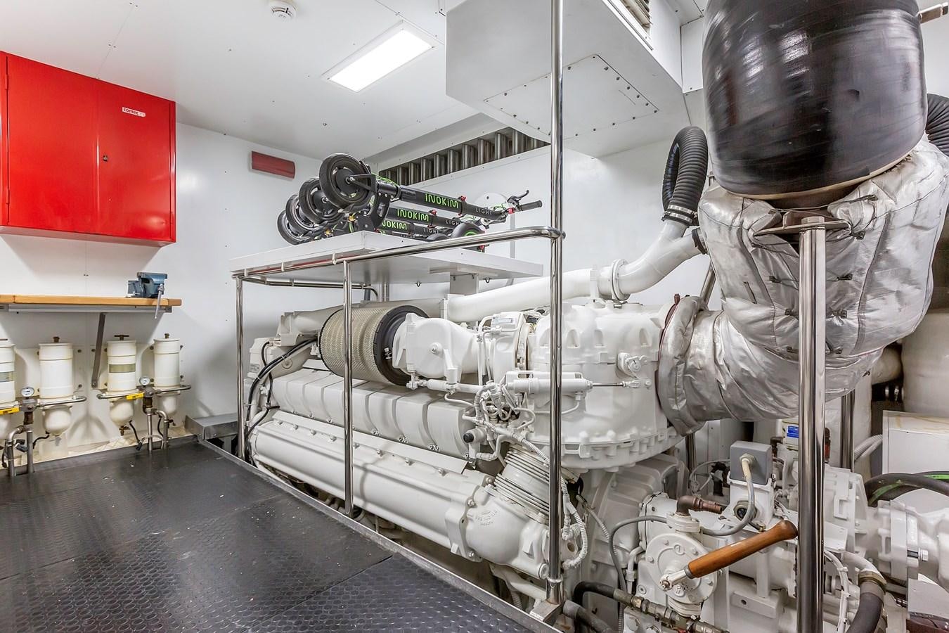 a machine in a room aboard THINK BIG Yacht for Sale