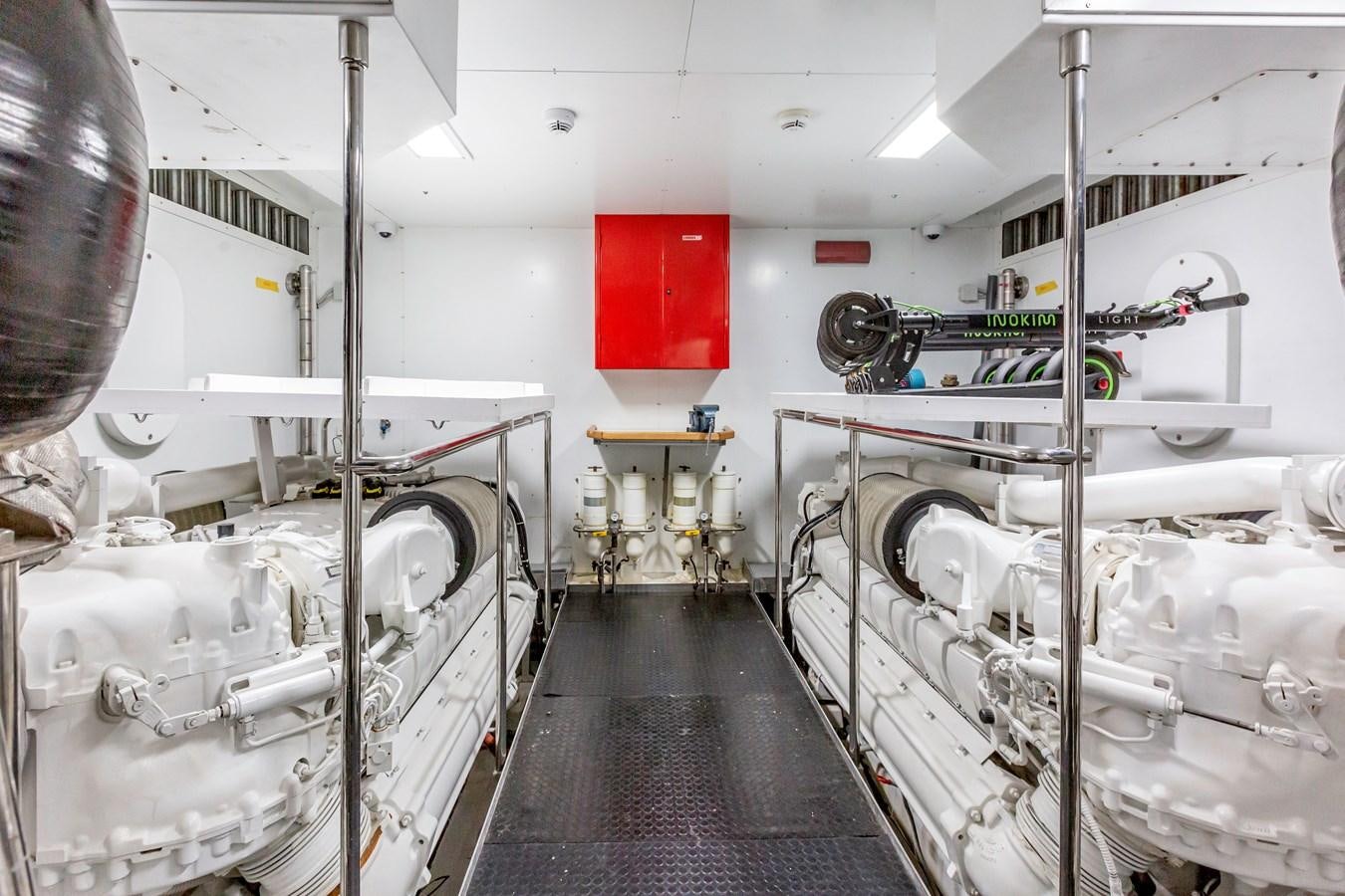 a room with white pipes aboard THINK BIG Yacht for Sale