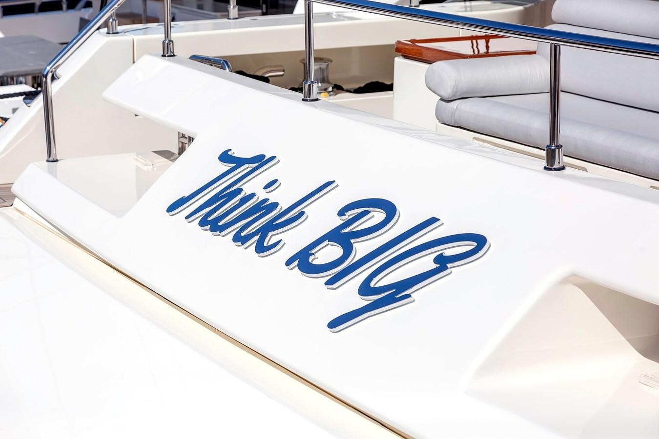 a white box with a blue logo aboard THINK BIG Yacht for Sale