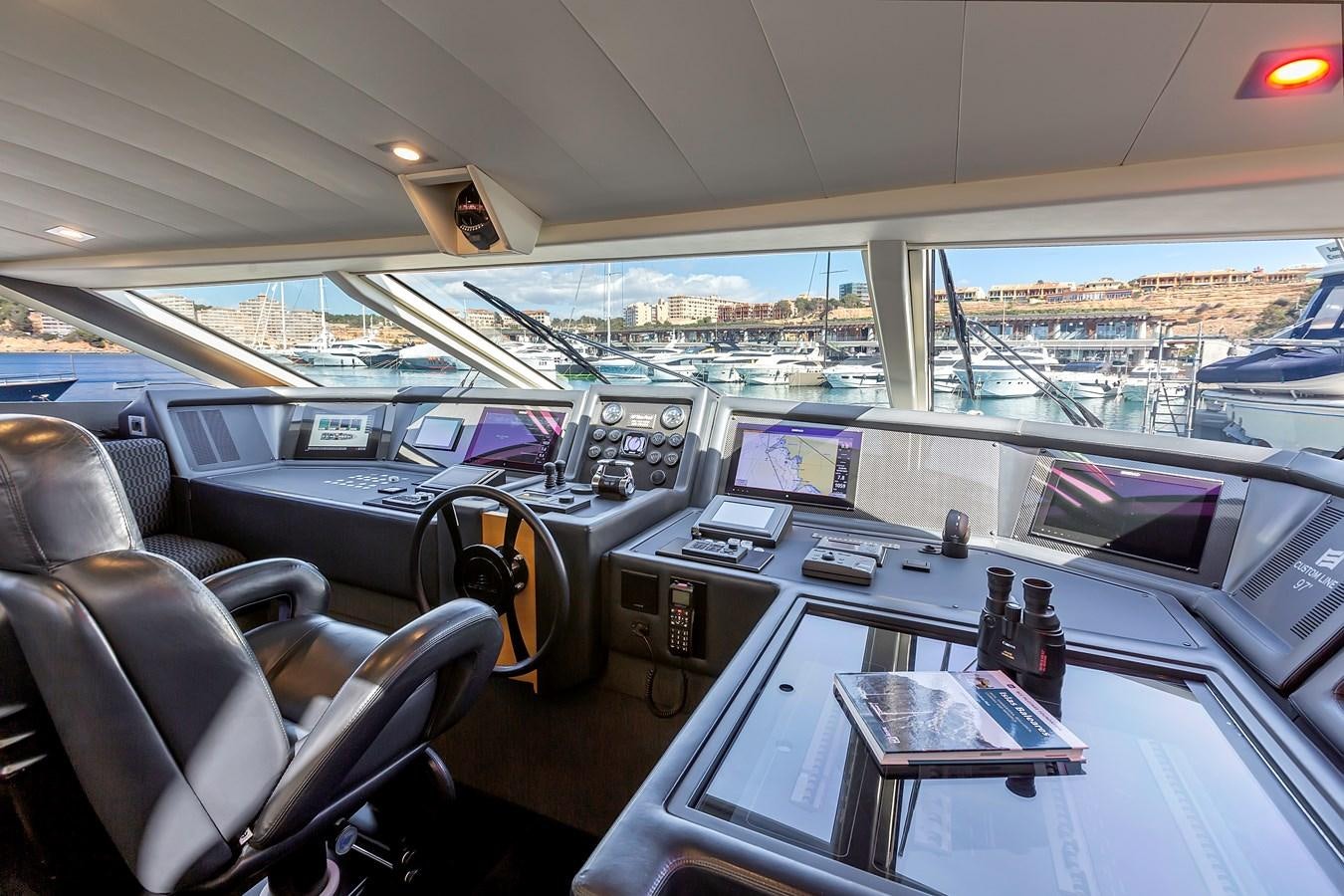 inside of a car aboard THINK BIG Yacht for Sale
