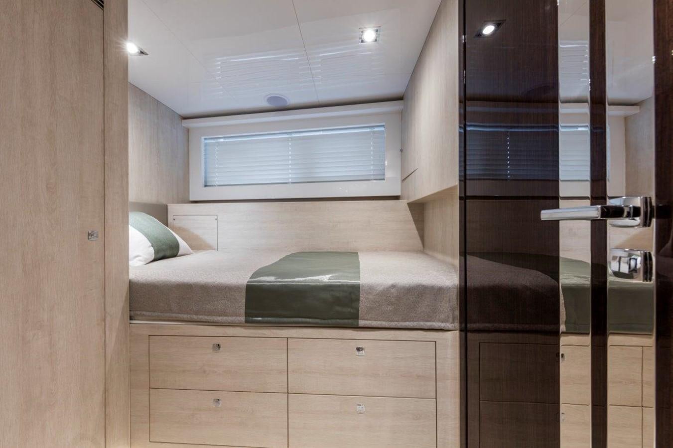 a bed in a room aboard PEARL Yacht for Sale