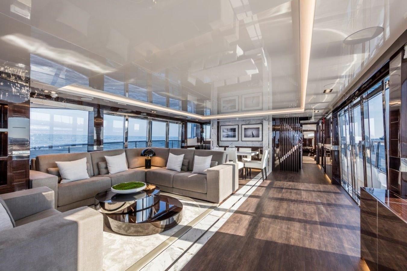 a large living room with a large open floor plan aboard PEARL Yacht for Sale
