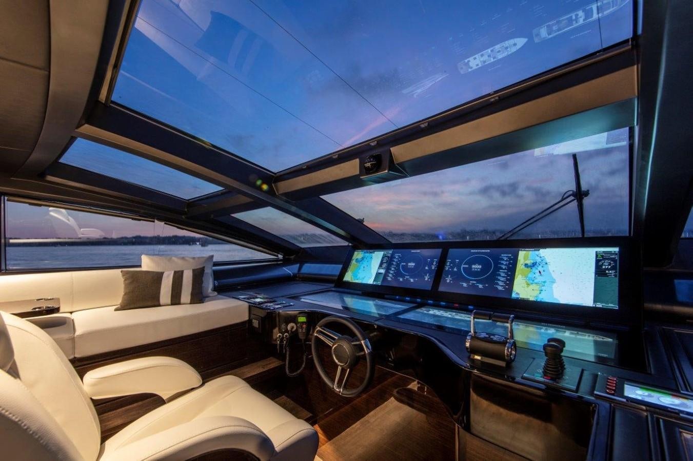 a room with a large screen aboard PEARL Yacht for Sale