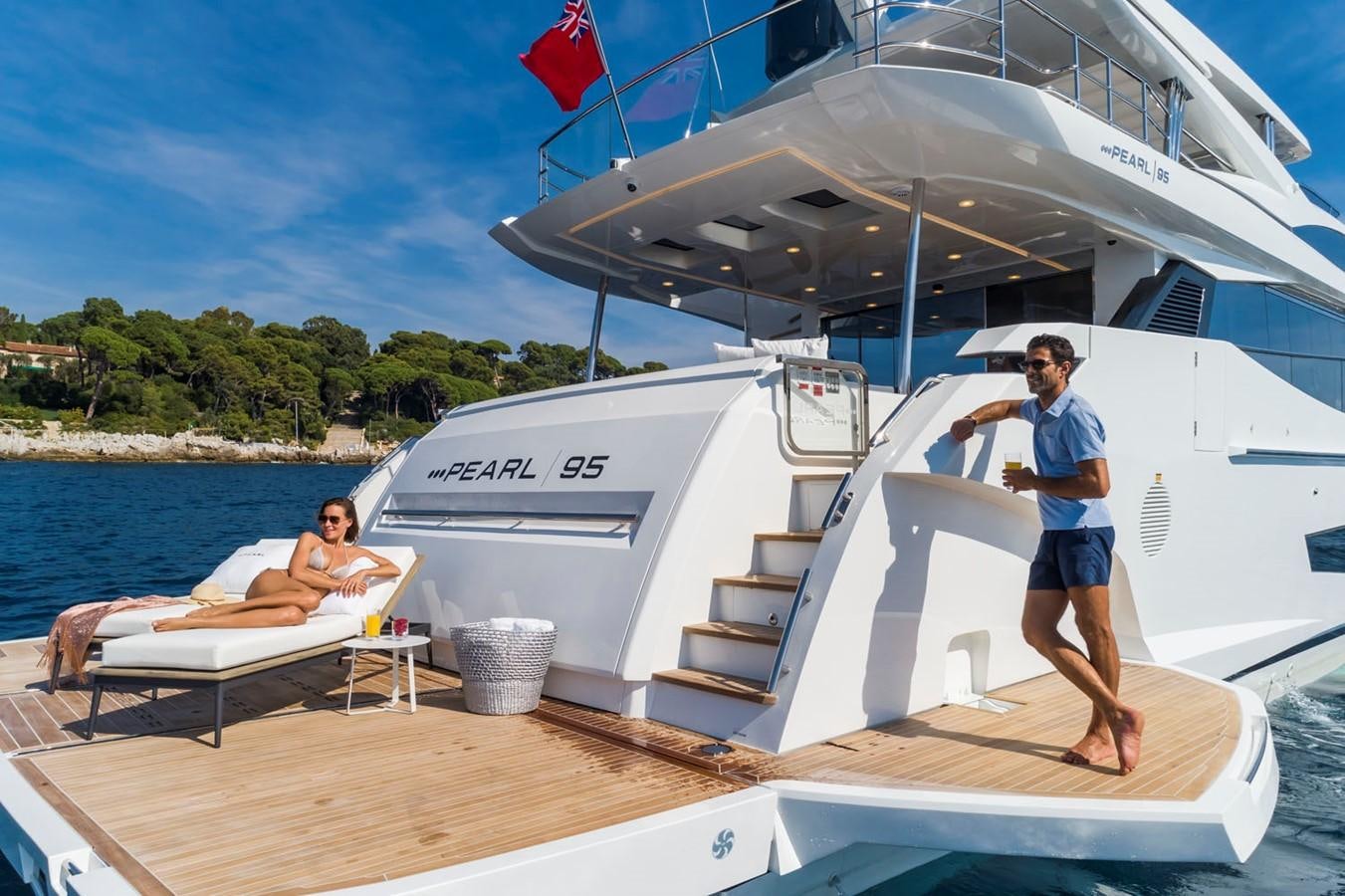 a person standing on a boat aboard PEARL Yacht for Sale