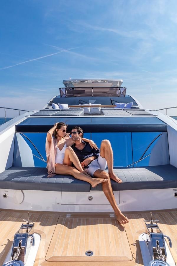 a group of people sitting on a boat aboard PEARL Yacht for Sale