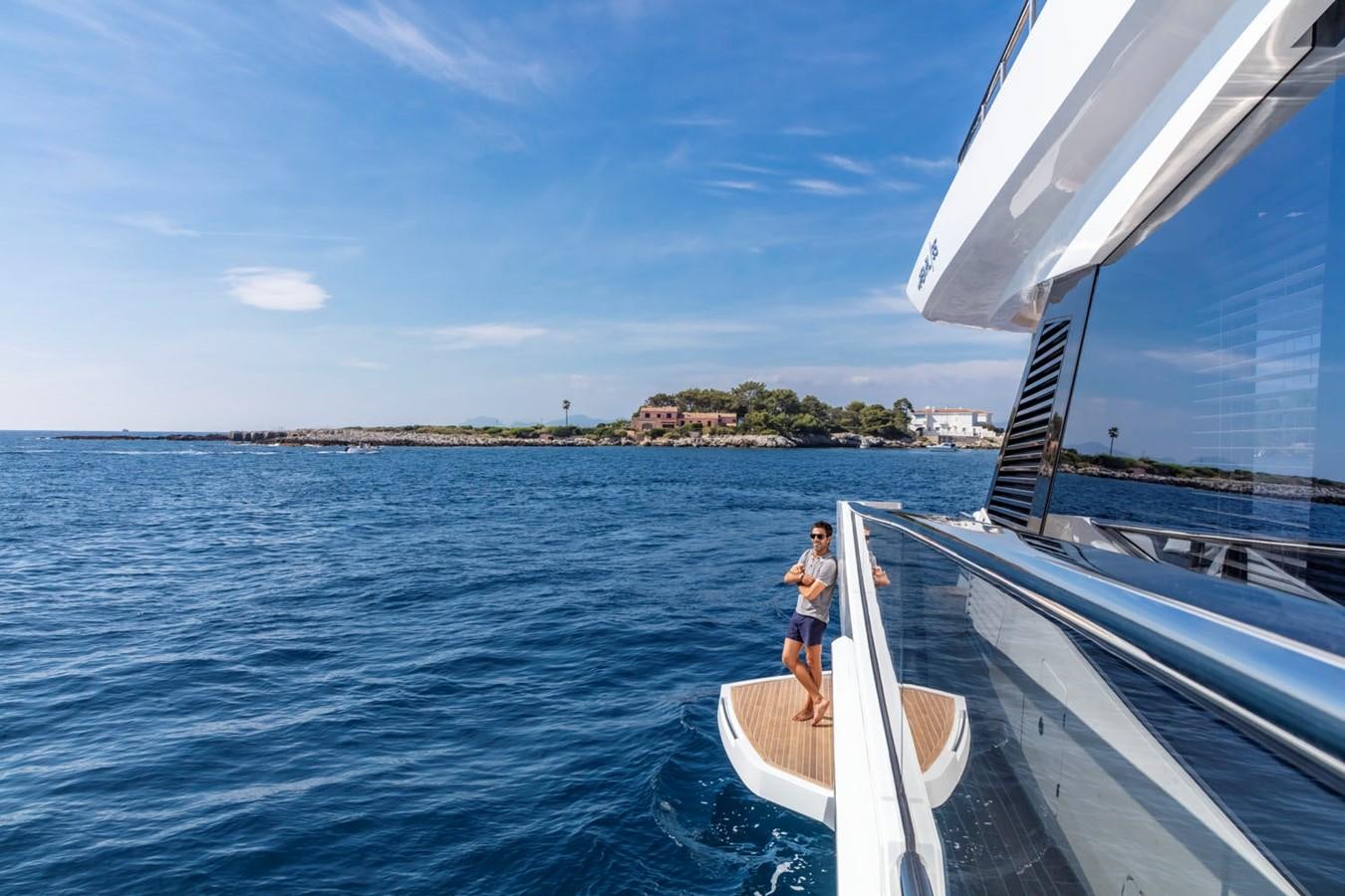 a person standing on a boat aboard PEARL Yacht for Sale