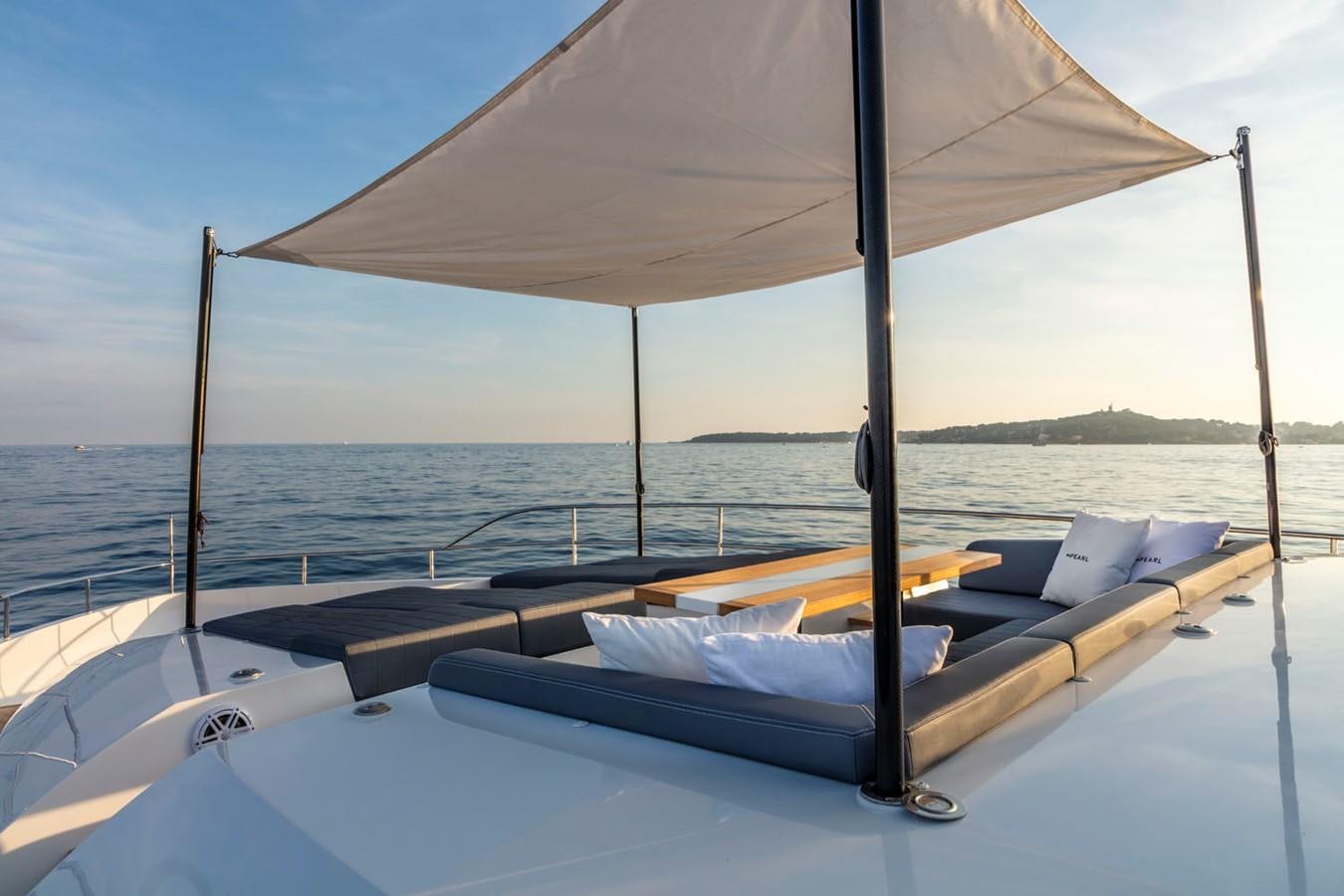 a lounge chair on a boat aboard PEARL Yacht for Sale