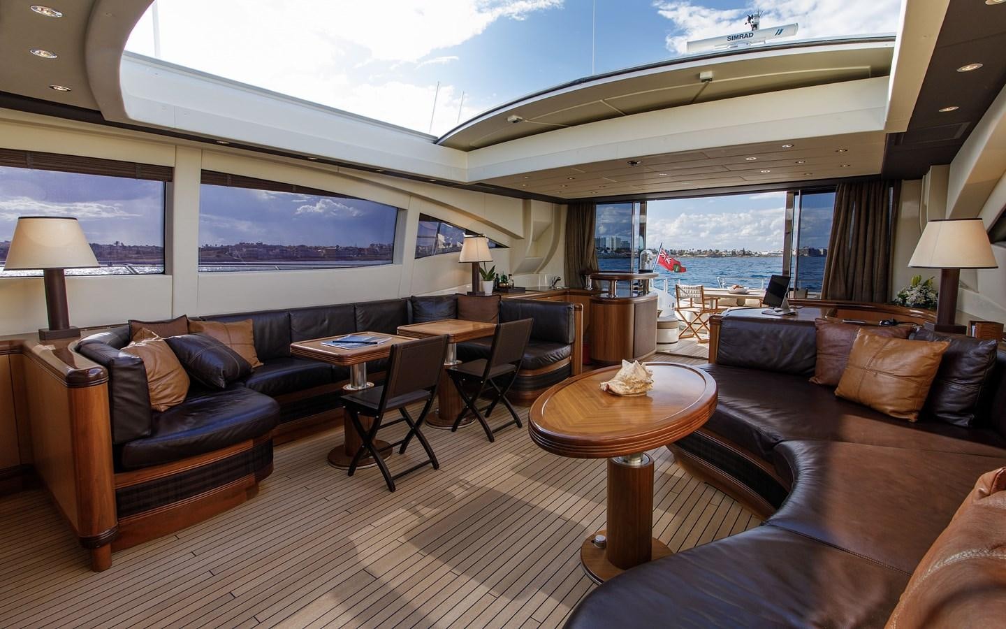 a living room with a large window aboard LITTLE ZOE Yacht for Sale