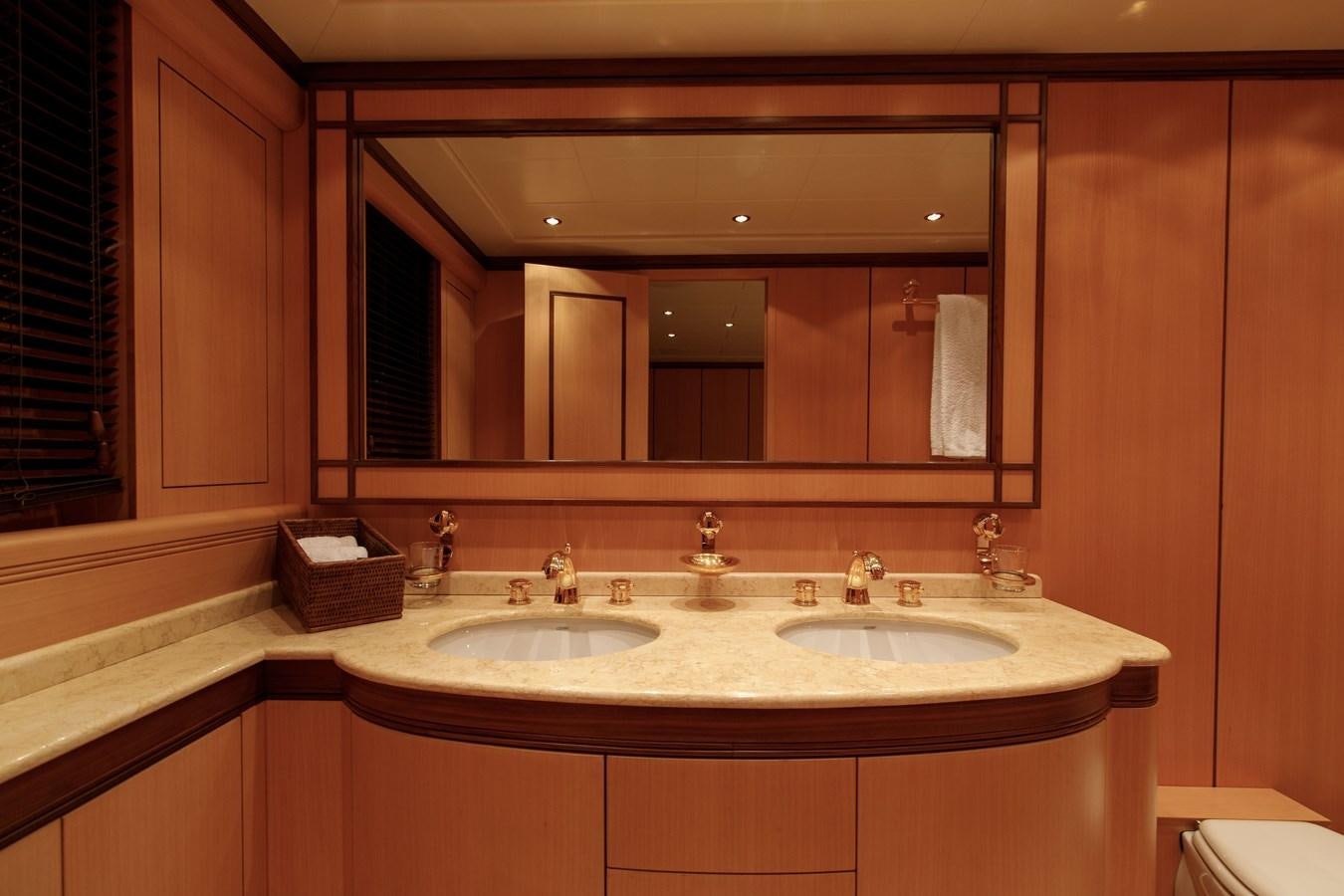 a bathroom with two sinks aboard LITTLE ZOE Yacht for Sale