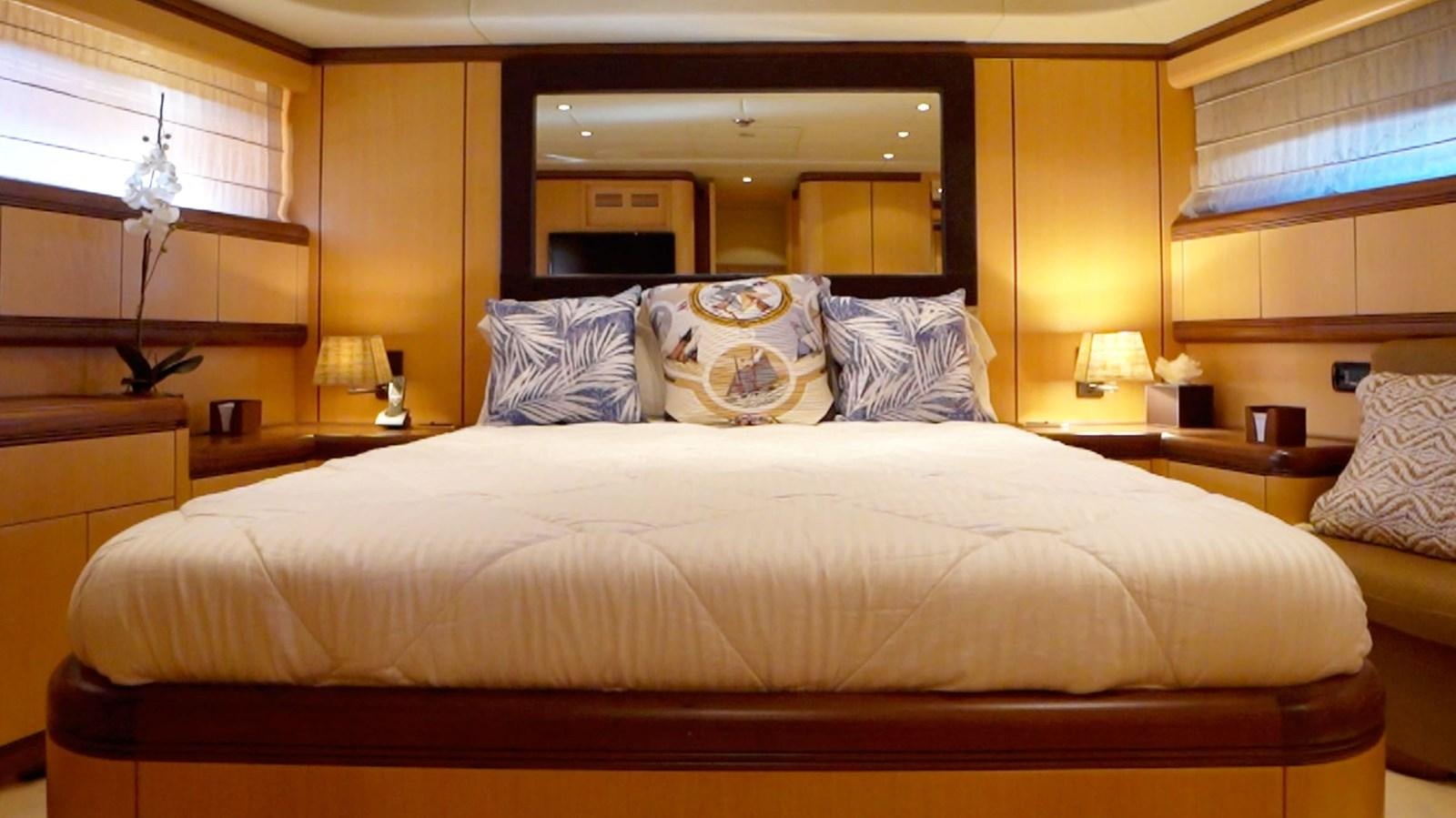 a bed with pillows aboard LITTLE ZOE Yacht for Sale