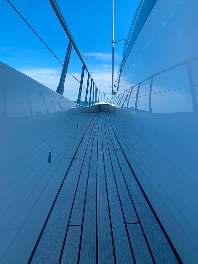 a long wooden dock aboard LITTLE ZOE Yacht for Sale