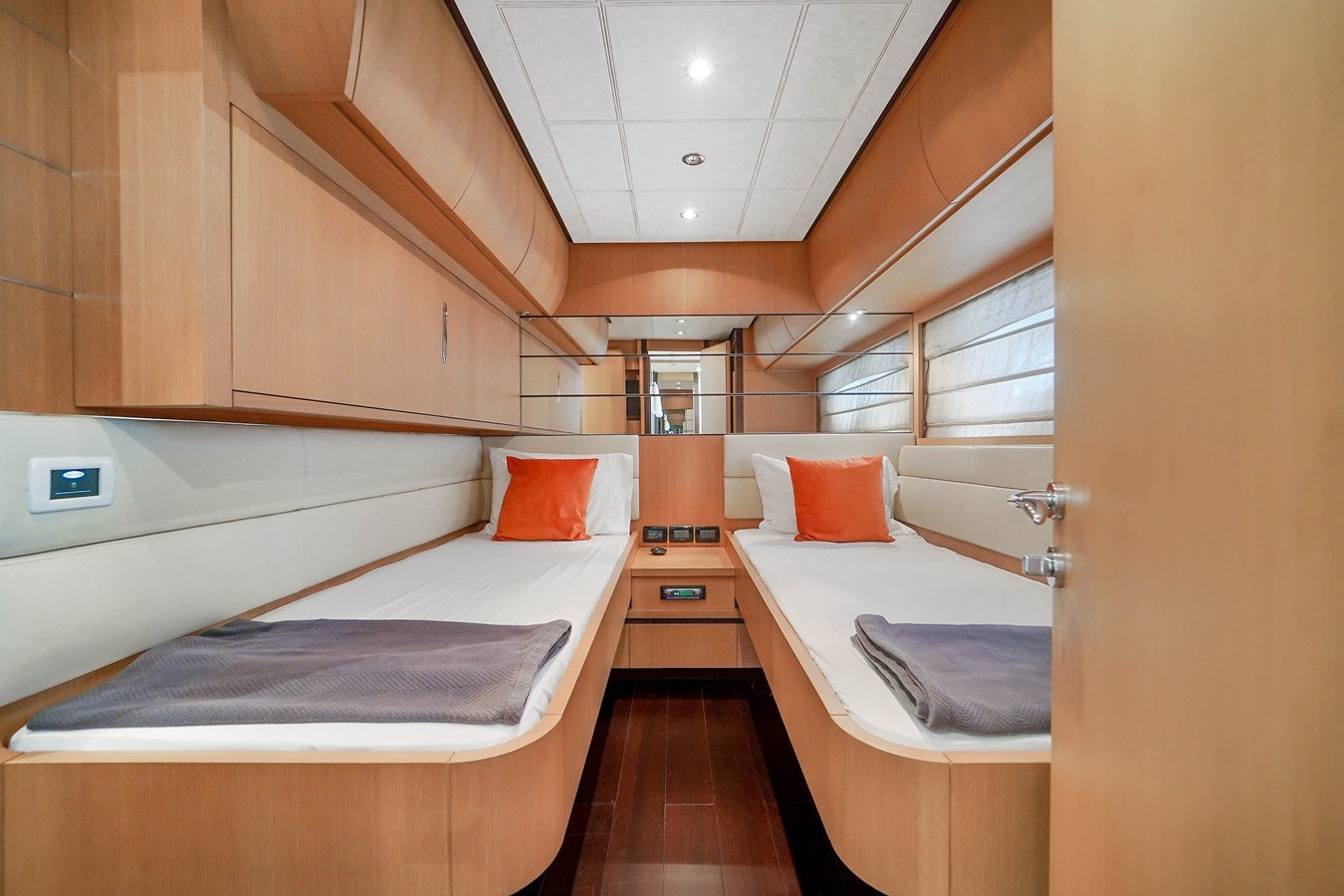 a room with a bed and a sink aboard SHADOW Yacht for Sale